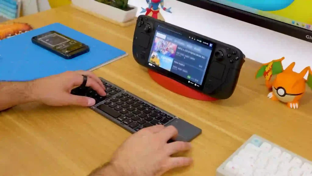 10 Gadgets de TEMU que No Puedes Perderte 9 Mini teclado plegable y estación de carga Daranener para un día más productivo.